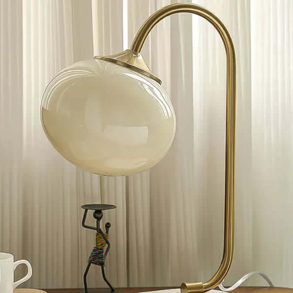 Moderne metal- og glasbordlampe i skumfidusform