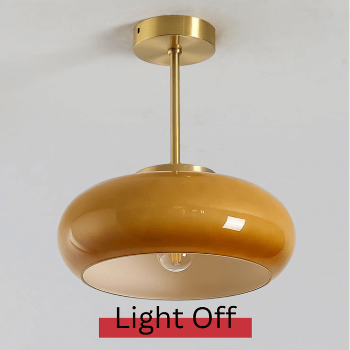 Vintage loftslampe med orange glaskuppel og kobberstel