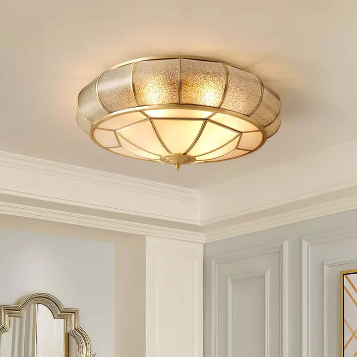Moderne guldbelagt pendellampe med tekstureret glas