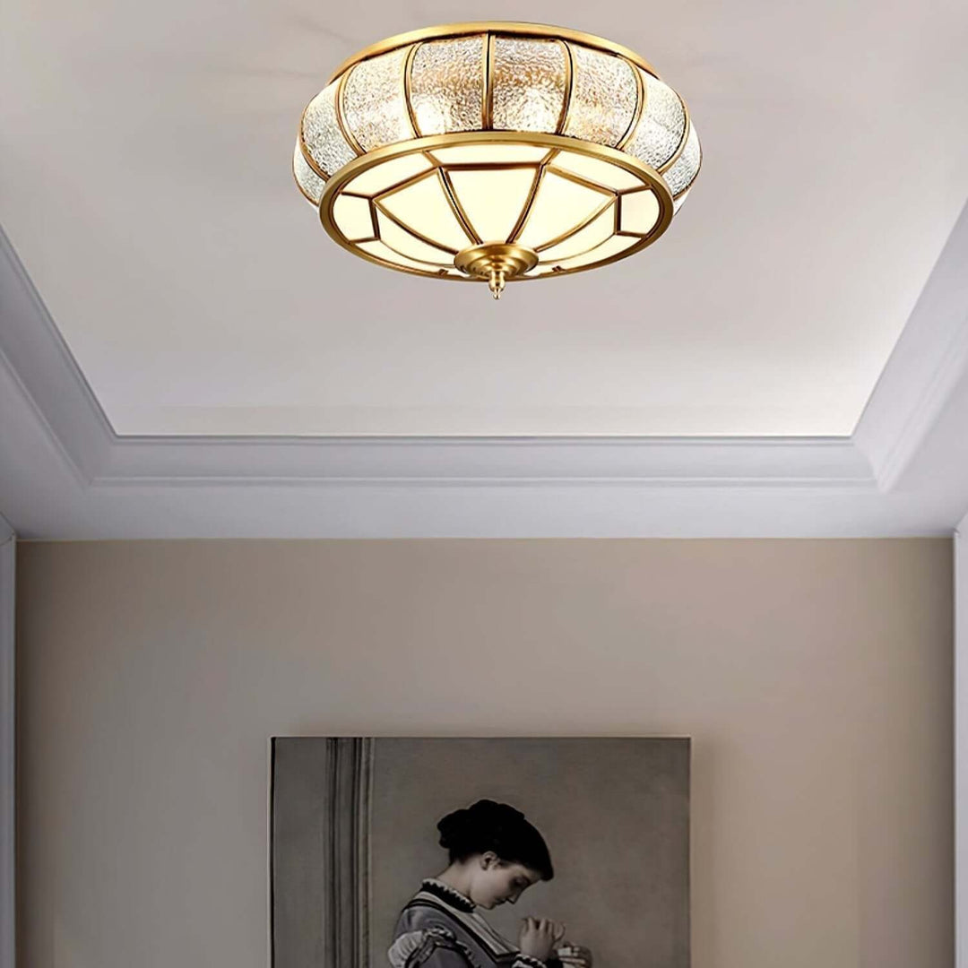Moderne guldbelagt pendellampe med tekstureret glas