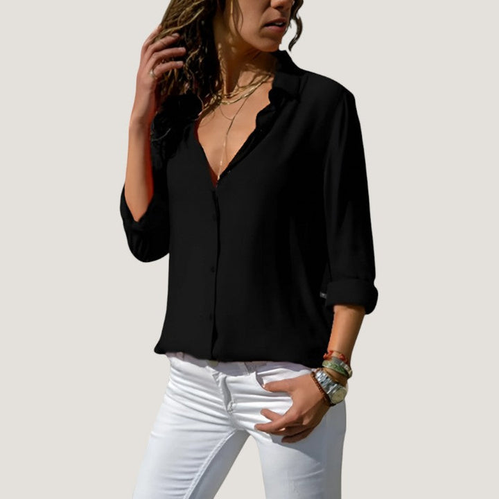 Tidløs chic dames bluse i polyester og bomuld, elegant snit, let stof, sofistikerede detaljer.