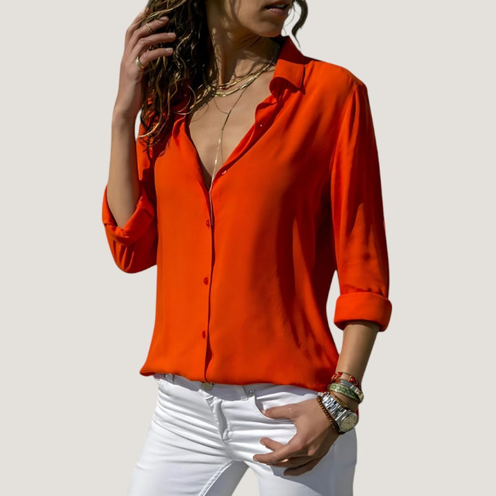 Tidløs chic dames bluse i polyester og bomuld, elegant snit, let stof, sofistikerede detaljer.