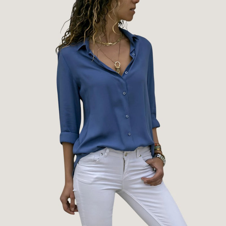 Tidløs chic dames bluse i polyester og bomuld, elegant snit, let stof, sofistikerede detaljer.