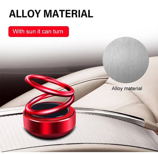 Aurinkoenergialla toimiva kaksoisrenkainen aromaterapiakoriste autoon, punainen metallinen design, raikas tuoksu.