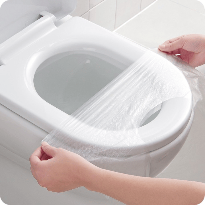 "Biohajoava kertakäyttöinen WC-istuinsuoja, 50 kpl. Valkoinen ja ympäristöystävällinen pakkaus."