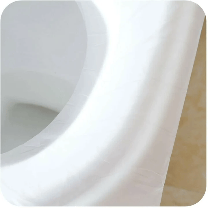 "Biohajoava kertakäyttöinen WC-istuinsuoja, 50 kpl. Valkoinen ja ympäristöystävällinen pakkaus."
