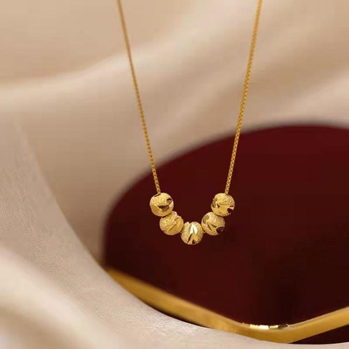 Elegantti helmikaulakoru ja rannekoru naisille hopean- ja kullanvärisinä, ainutlaatuinen muotoilu, monikäyttöinen.