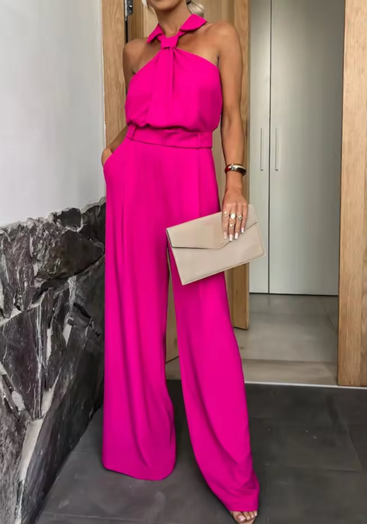 Elegant dame jumpsuit med vide ben, høj krave og blødt stof, perfekt til særlige lejligheder.