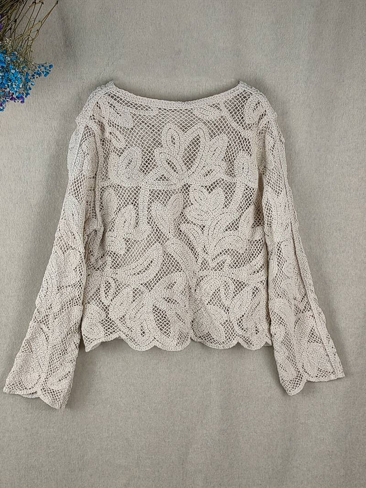 Elegant dame bluse i blonde med blomstermønster, stilfuld og behagelig til både hverdag og fest.
