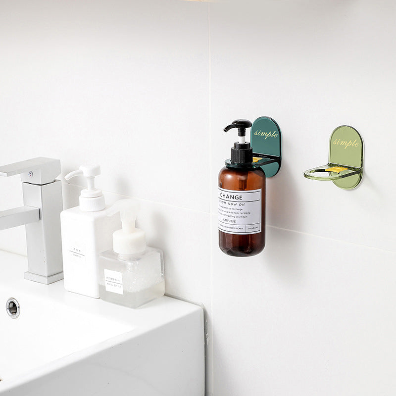 Elegant plastik bruser gel holder, tilgængelig i mørkegrøn og lysegrøn, passer til forskellige flaskestørrelser og indretninger.