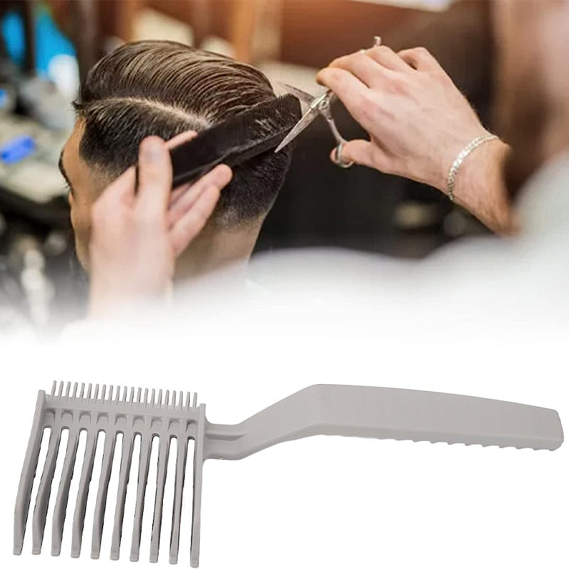 Ergonomisk herre gradientkam, sorte og grå nuancer, til hårklipning, brugt i en salon.