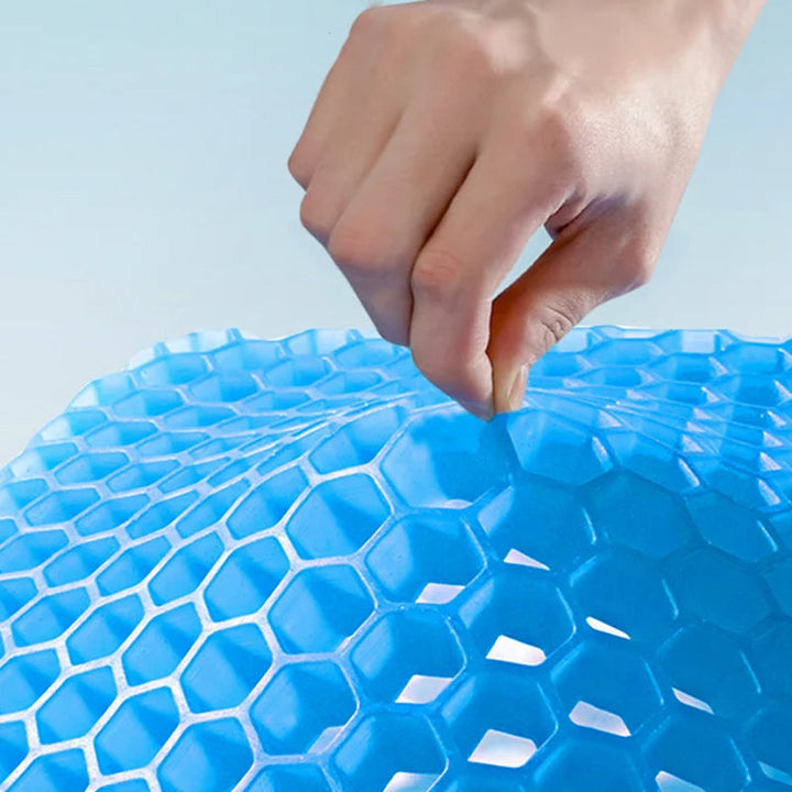 Ergonomisk blå gelpude med honeycomb-struktur, til sæder, giver støtte og køling til hjemme- og kontorbrug.