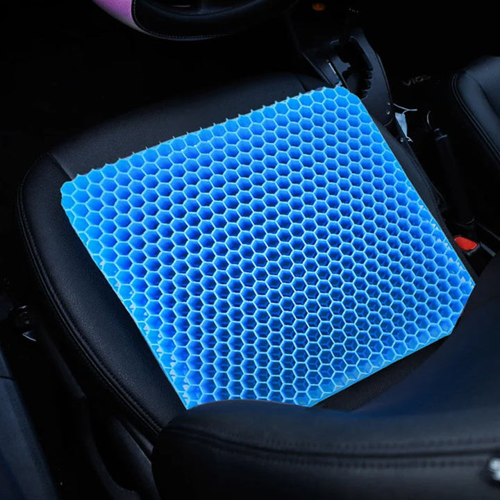 Ergonomisk blå gelpude med honeycomb-struktur, til sæder, giver støtte og køling til hjemme- og kontorbrug.