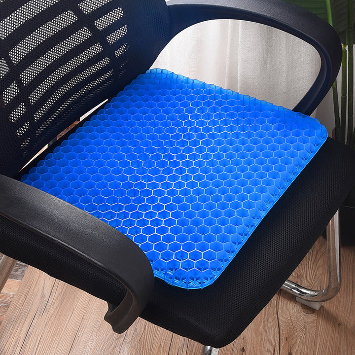 Ergonomisk blå gelpude med honeycomb-struktur, til sæder, giver støtte og køling til hjemme- og kontorbrug.