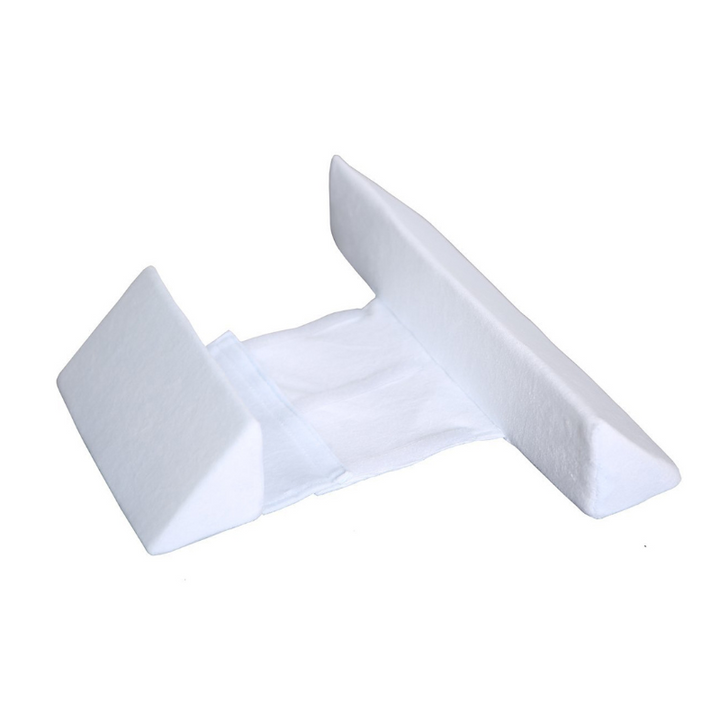 Ergonomisk babypude til liggende position, støtter hoved og krop, åndbart materiale, neutrale farver, forhindrer fladt hoved.