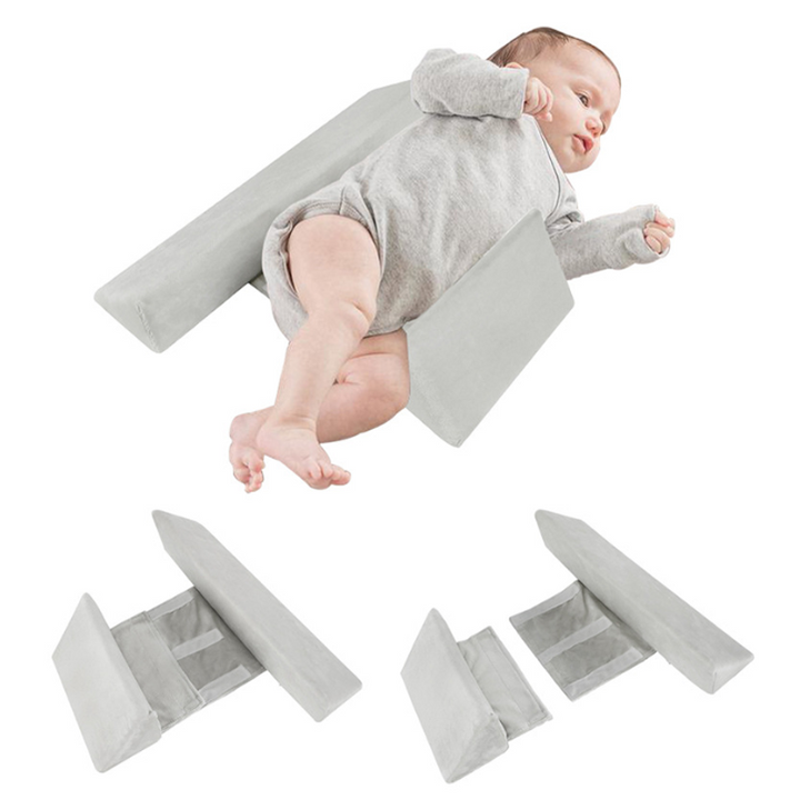Ergonomisk babypude til liggende position, støtter hoved og krop, åndbart materiale, neutrale farver, forhindrer fladt hoved.