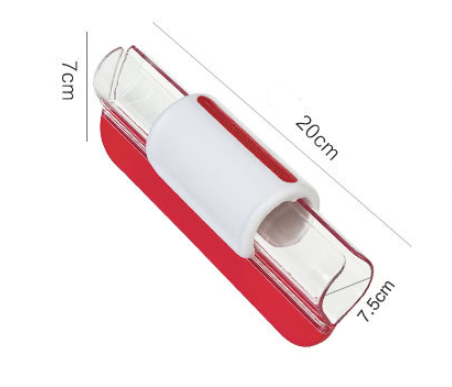 Ergonomisk, farverig frugt- og grøntsagsskærer i nærbillede, rustfrit stål og plastik, moderne design.