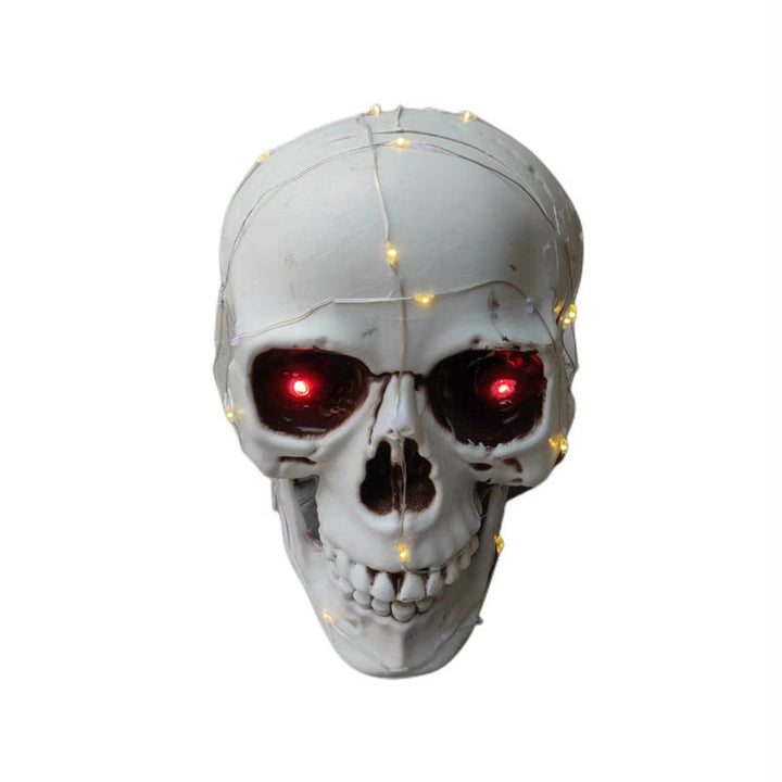 Halloween uhyggelige dekorationslys til haven, orange og sorte farver, realistisk design, skaber en skræmmende atmosfære.