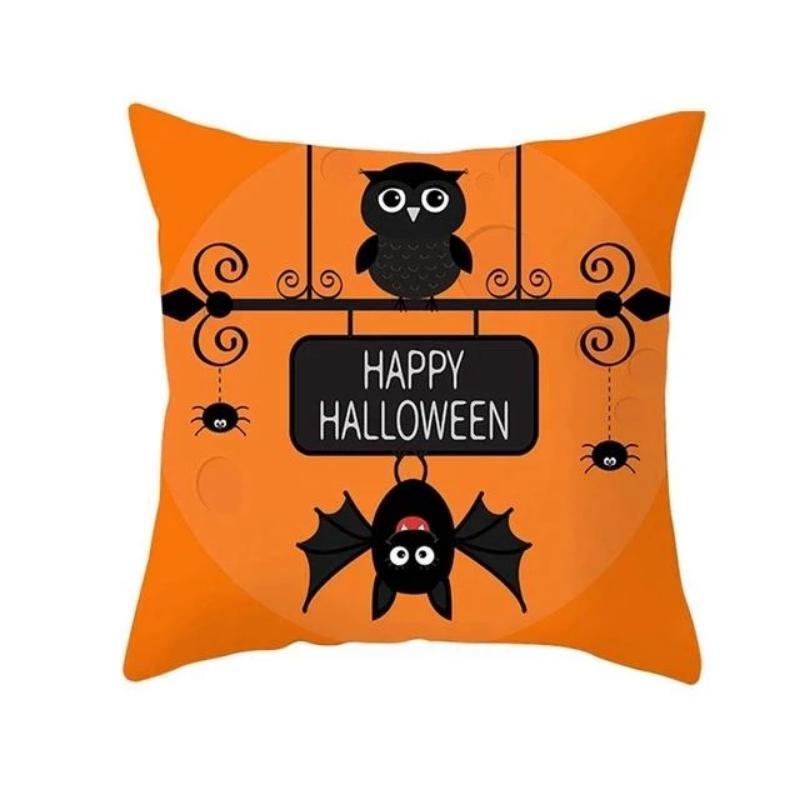 Halloween græskar pudebetræk, klare farver og sjove græskarmotiver skaber en festlig atmosfære i hjemmet.