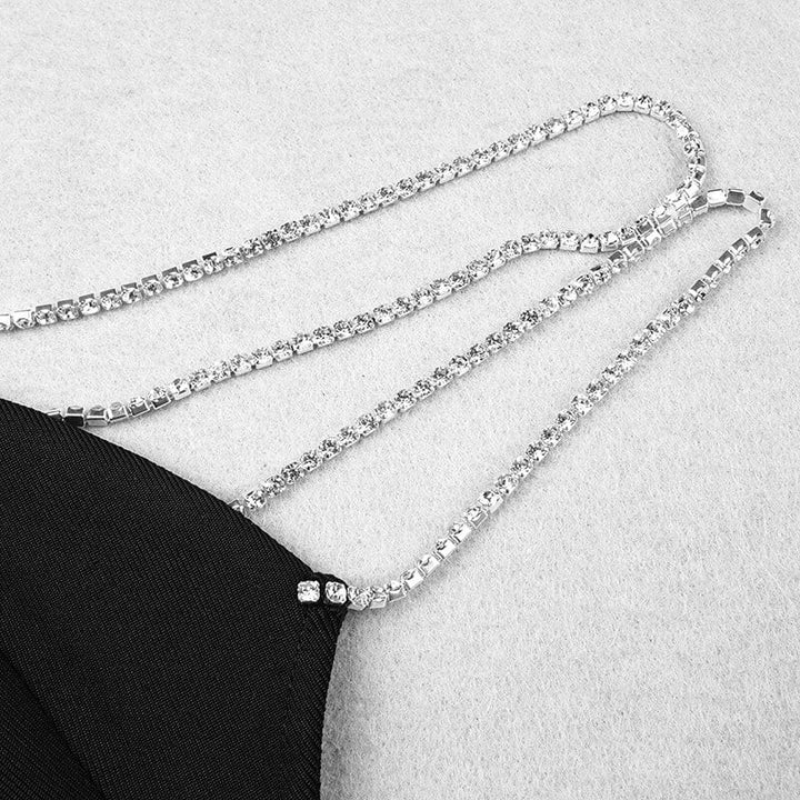 Dame Bodycon Mini Kjole med Rhinestone Stropper, tætsiddende pasform, fremhæver feminine kurver, glamourøs og selvsikker stil.