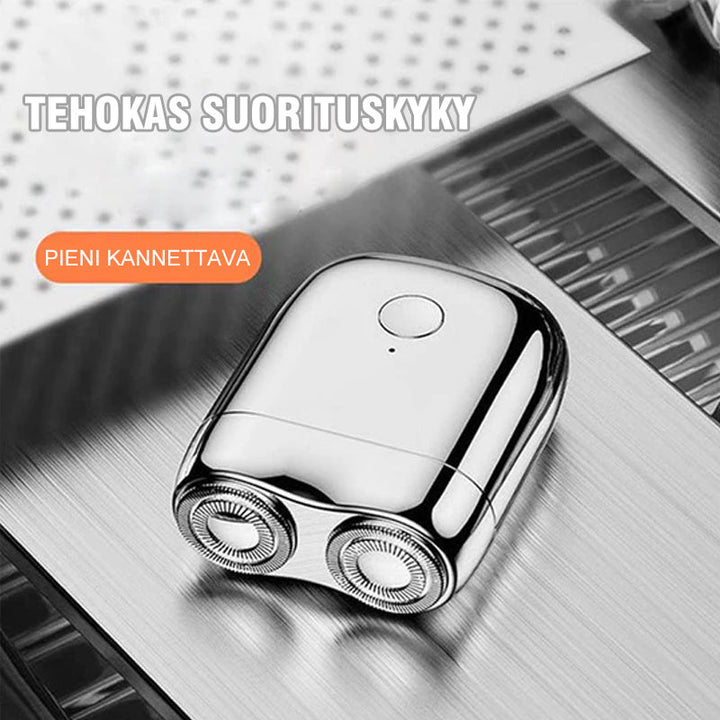 Sølv genopladelig minibarbermaskine, kompakt og stilfuld, med moderne design og holdbar metallegering.