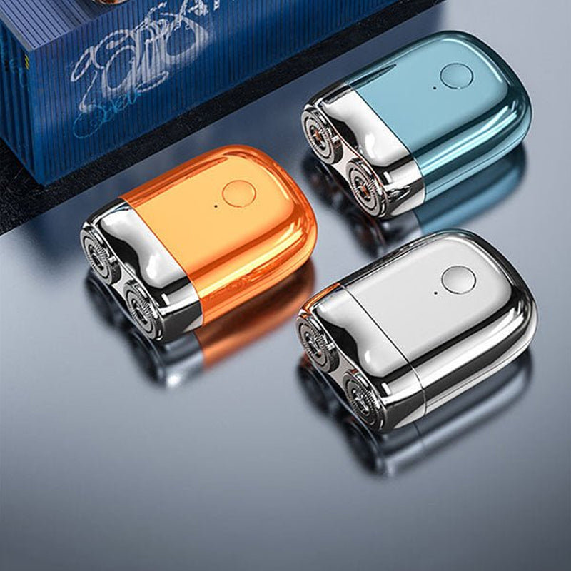 Sølv genopladelig minibarbermaskine, kompakt og stilfuld, med moderne design og holdbar metallegering.
