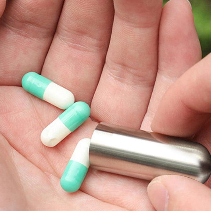 Sølv vandtæt pilleæske i rustfrit stål, kompakt og holdbar, perfekt til daglig brug til at sikre din medicin