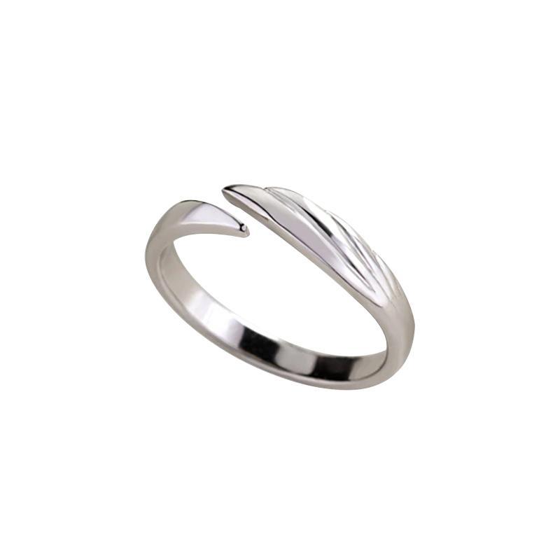 Sølv par-ringe, hvid og sort, symboliserer lysets og mørkets modsætning.