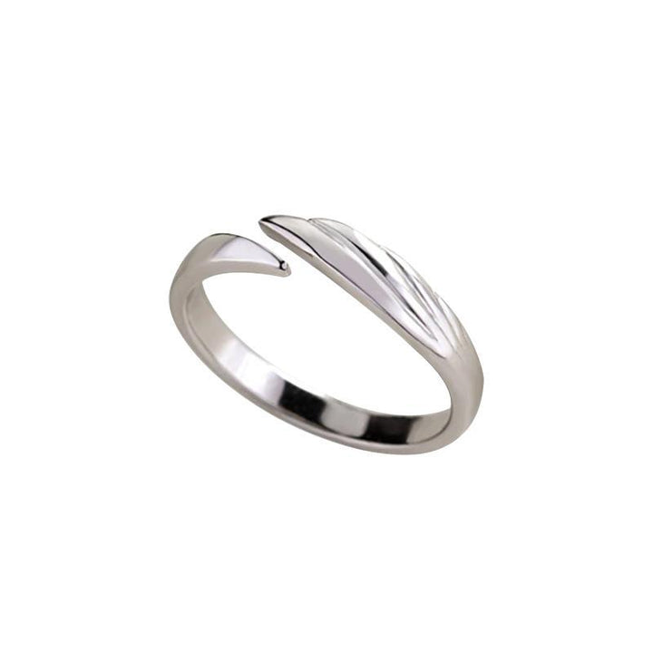Sølv par-ringe, hvid og sort, symboliserer lysets og mørkets modsætning.
