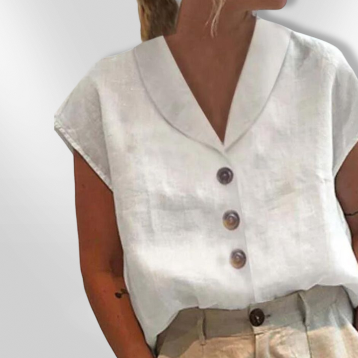 Dame bluse med bred krave, store dekorative knapper, blødt materiale, flere farver.