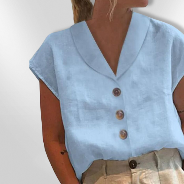 Dame bluse med bred krave, store dekorative knapper, blødt materiale, flere farver.