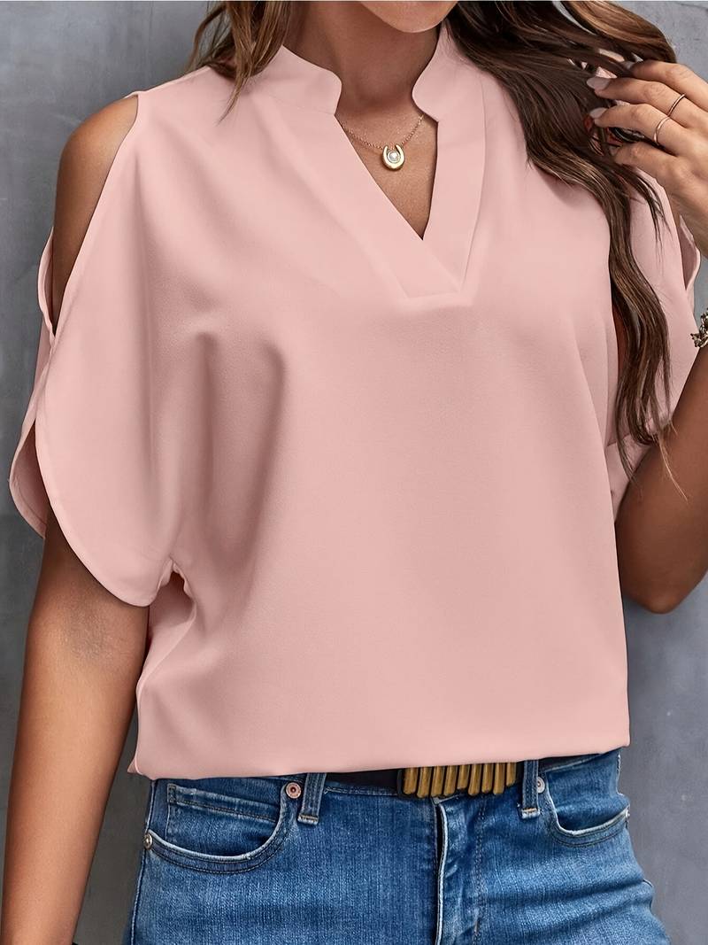 Luftig damebluse med åben skulder til sommerbrug, i en trendende stil.