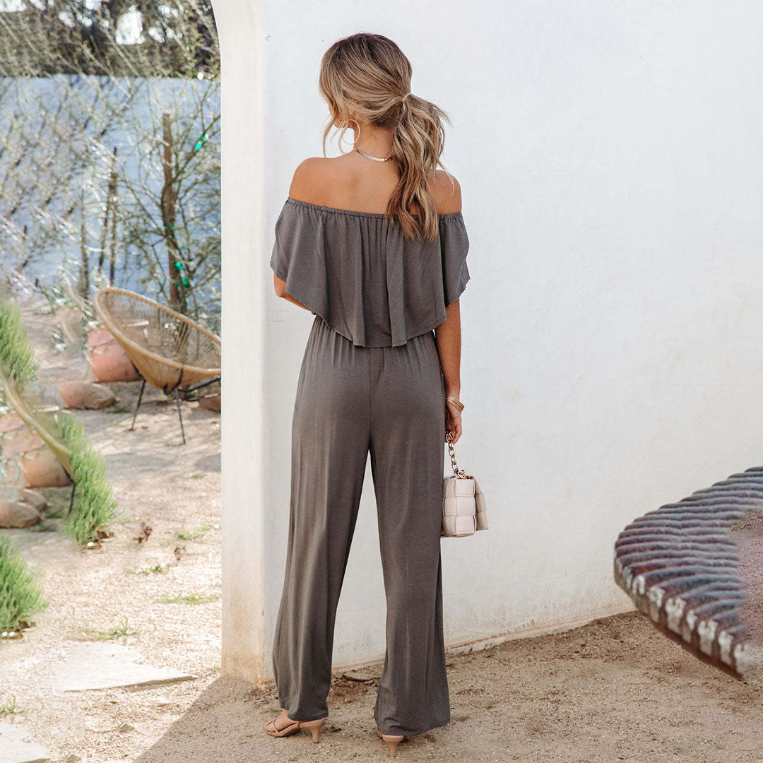 Luftige dame sommer overalls i grå, off-shoulder, afslappet pasform, åndbart stof, perfekt til sommerdage.