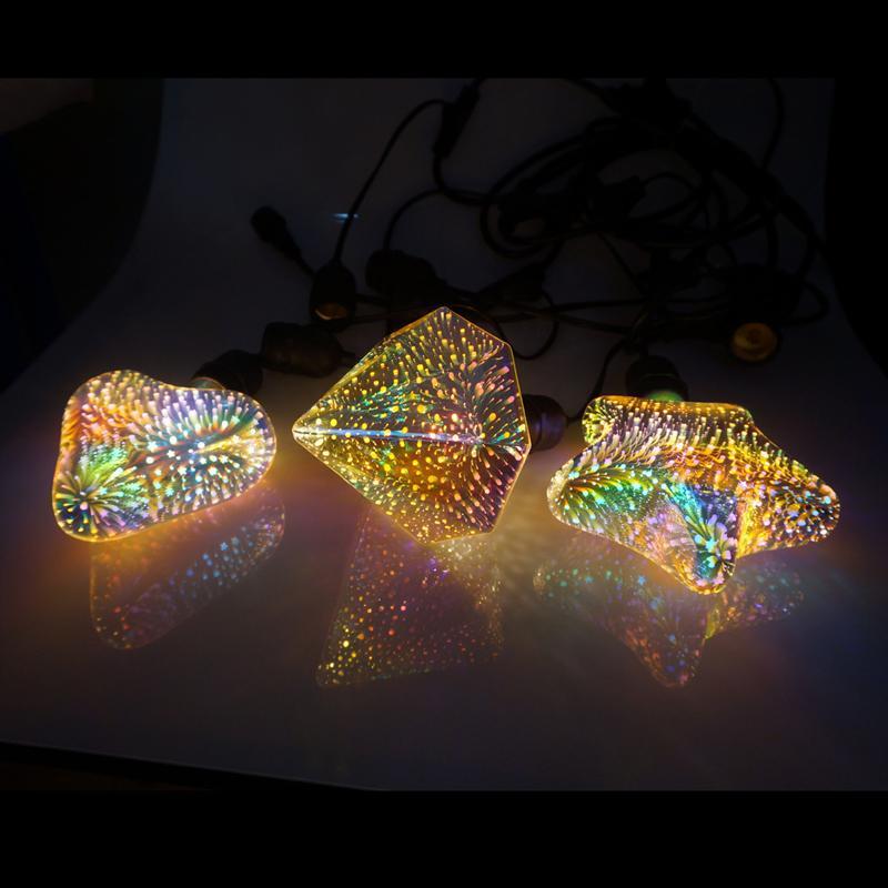 Fyrværkeri effekt LED-pære, farverig og dekorativ, velegnet til fester og indretning, med 3D-effekt.