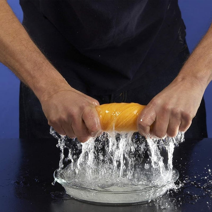 Absorberende plantefiber rengøringsklud, holdbar og farverig; orange og blå i forskellige størrelser til hjemmets rengøring.