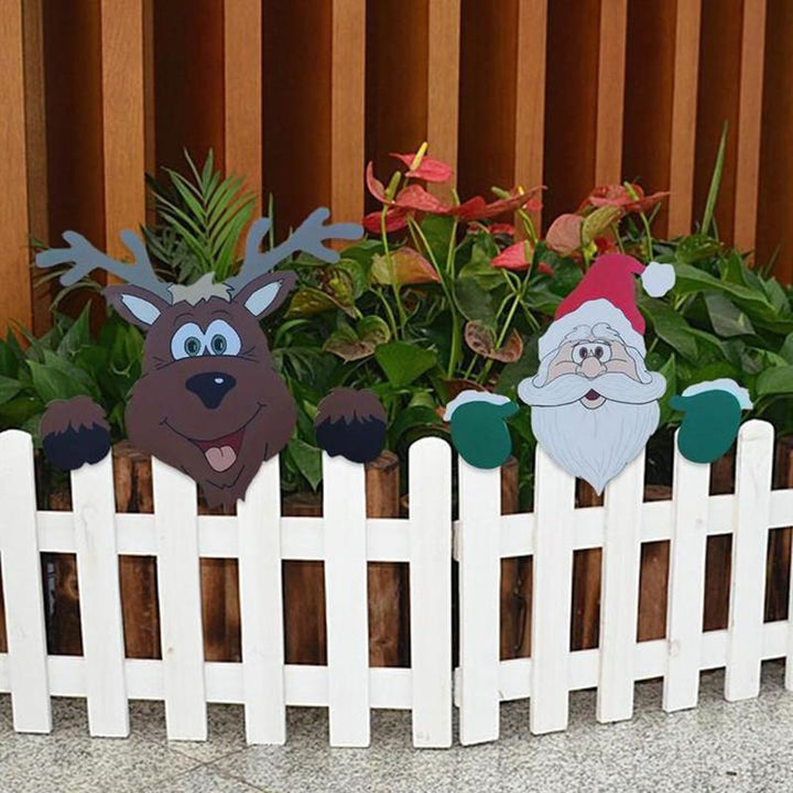Juledekoration til hegn, figurer af julemand, snemand og rensdyr, skaber festlig stemning i din have.
