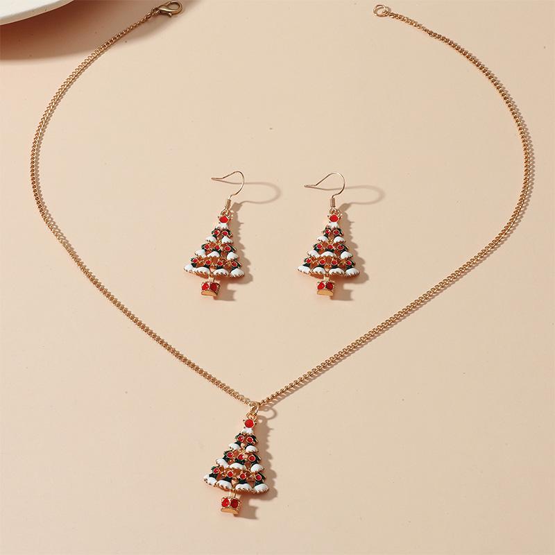 Weihnachtliche Ohrringe und Halsketten, vier Designs: Schneemann, Weihnachtsmann, Weihnachtsbaum, Schneeflocke, Metalllegierung.