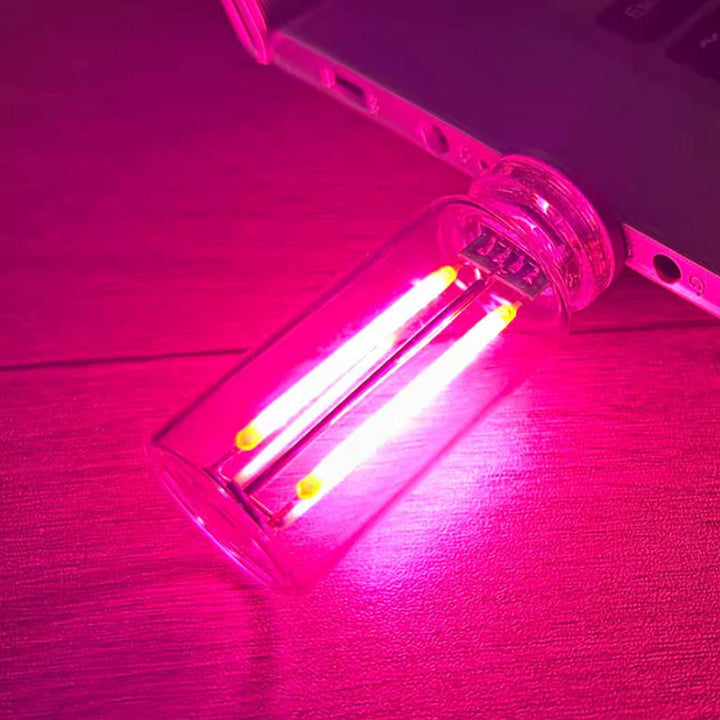 Bærbar LED Glas Natlampe med Berøringskontrol, strømlinet design, USB-tilslutning, flerfarvet belysning, brug i soveværelse.