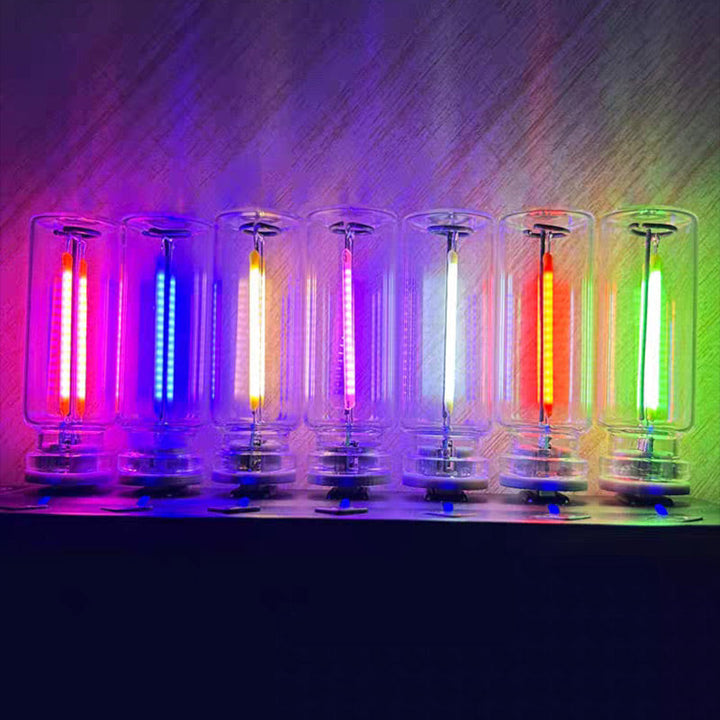 Bærbar LED Glas Natlampe med Berøringskontrol, strømlinet design, USB-tilslutning, flerfarvet belysning, brug i soveværelse.