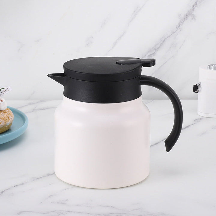 "Kannettava termospullo, ruostumatonta terästä, moderni muotoilu, ergonominen kahva, 800ml tai 1000ml kapasiteetti."