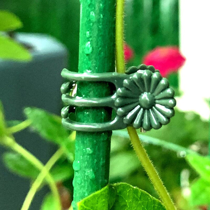 Planteholdere 14x15mm, let plast, understøtter blomsterstængler, grøn farve, velegnet til orkideer og stueplanter.