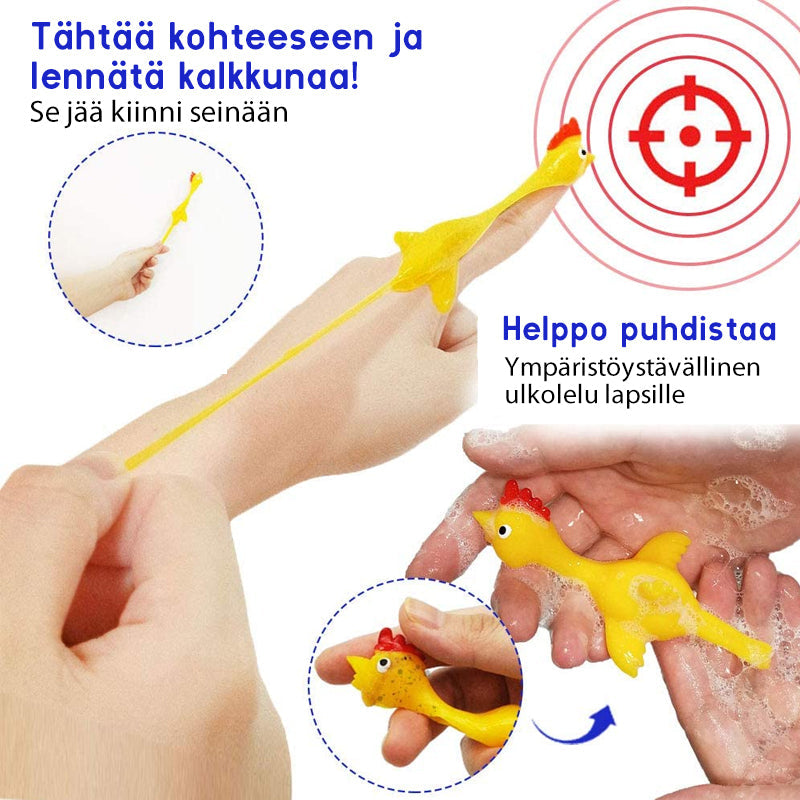 Gul kalkununge legetøj på grønt græs, sjovt familiespil til øjeblikke, lys klar farve til udendørs leg.