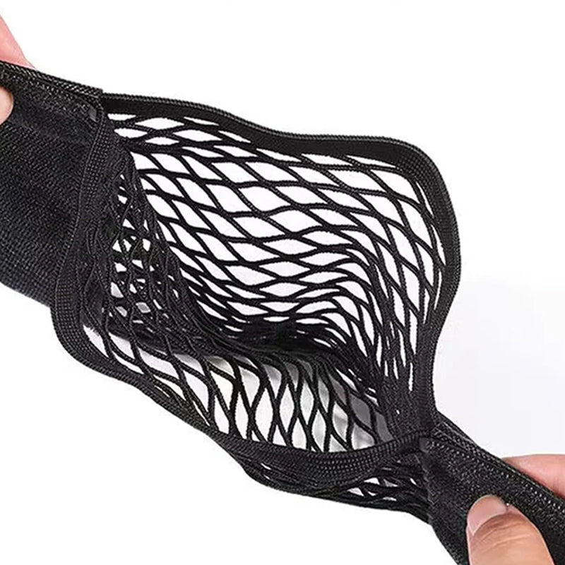 Holdbart opbevaringsnet til plastikposer i polyester, gråt, kompakt og alsidigt til hjemmet.