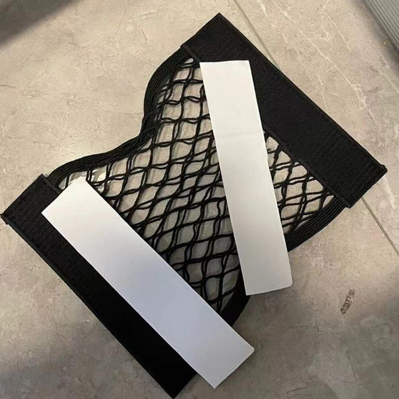 Holdbart opbevaringsnet til plastikposer i polyester, gråt, kompakt og alsidigt til hjemmet.
