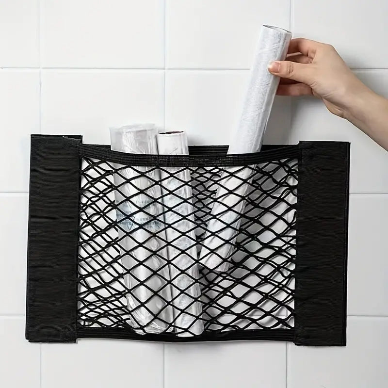 Holdbart opbevaringsnet til plastikposer i polyester, gråt, kompakt og alsidigt til hjemmet.