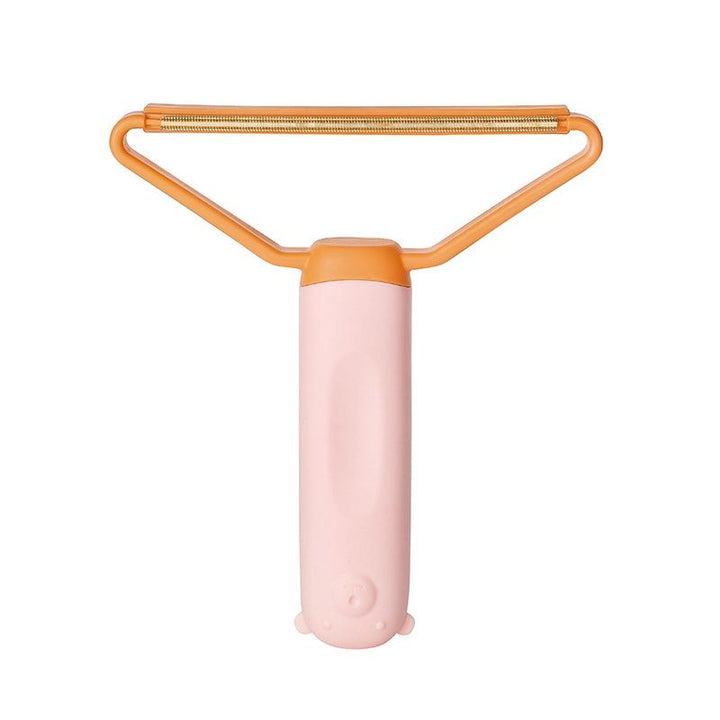 Let, flerfarvet dobbelsidet fnugfjerner, ergonomisk design, egnet til uld, bomuld og sarte materialer.