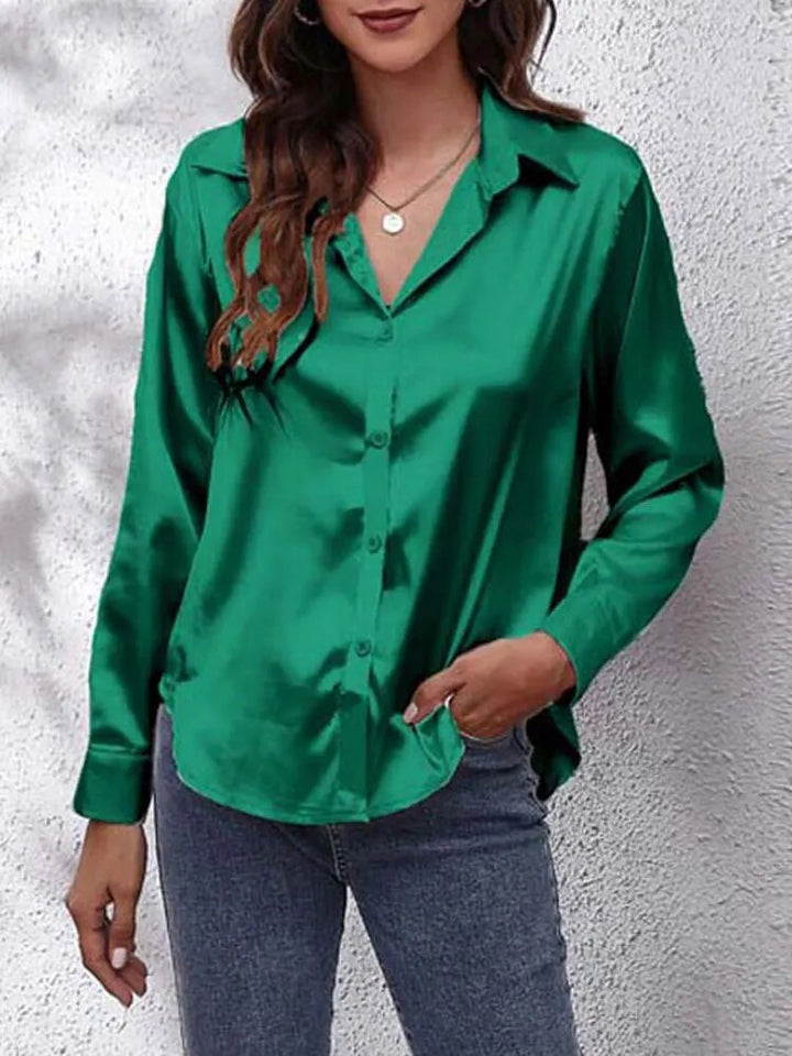 Skinnende dame satin skjorte, lange ærmer, glat skinnende overflade, alsidigt design, elegant stil, egnet til alle anledninger