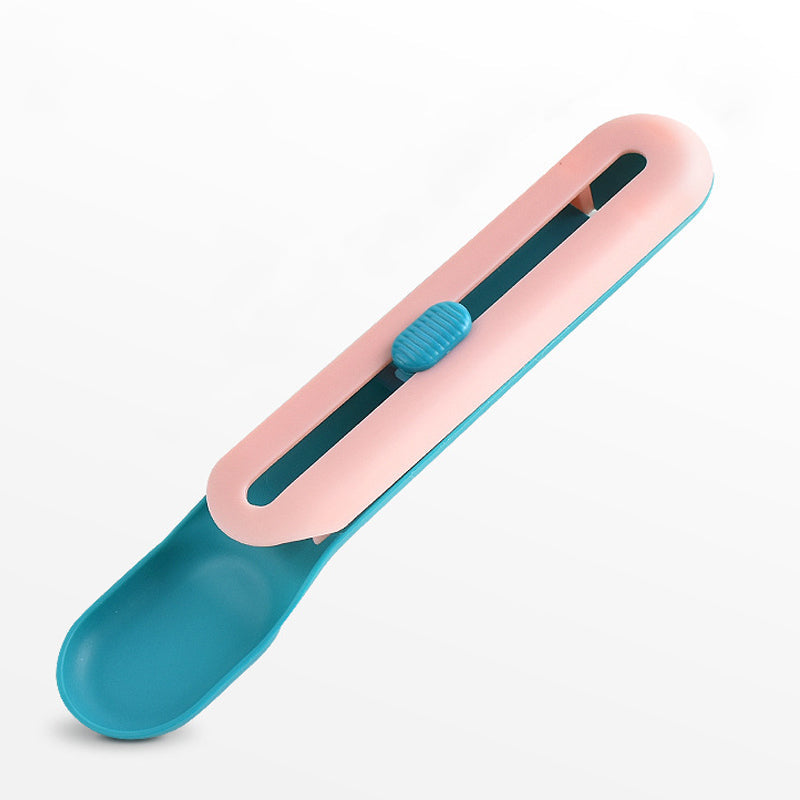 Katte vådfoder ske med tilknyttet pind; innovativ blå og lyserød enhed, der gør fodring ren.