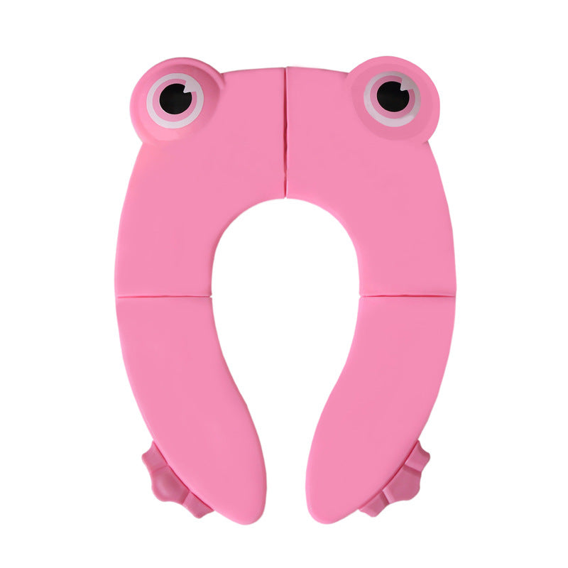 Sammenklappelig børne-toiletstol, grøn/blå/pink, praktisk og skridsikker, nem at opbevare.