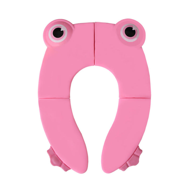 Sammenklappelig børne-toiletstol, grøn/blå/pink, praktisk og skridsikker, nem at opbevare.